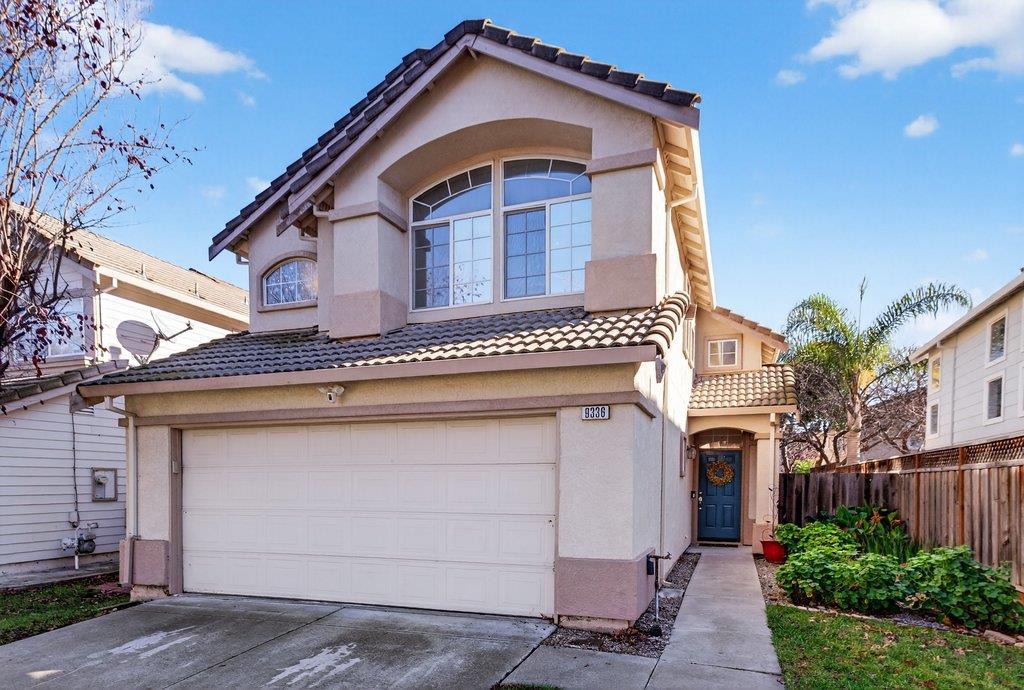 9336 Lariat Drive Gilroy, CA 95020 - Photo 1 of 41 a front view of a house with a garage