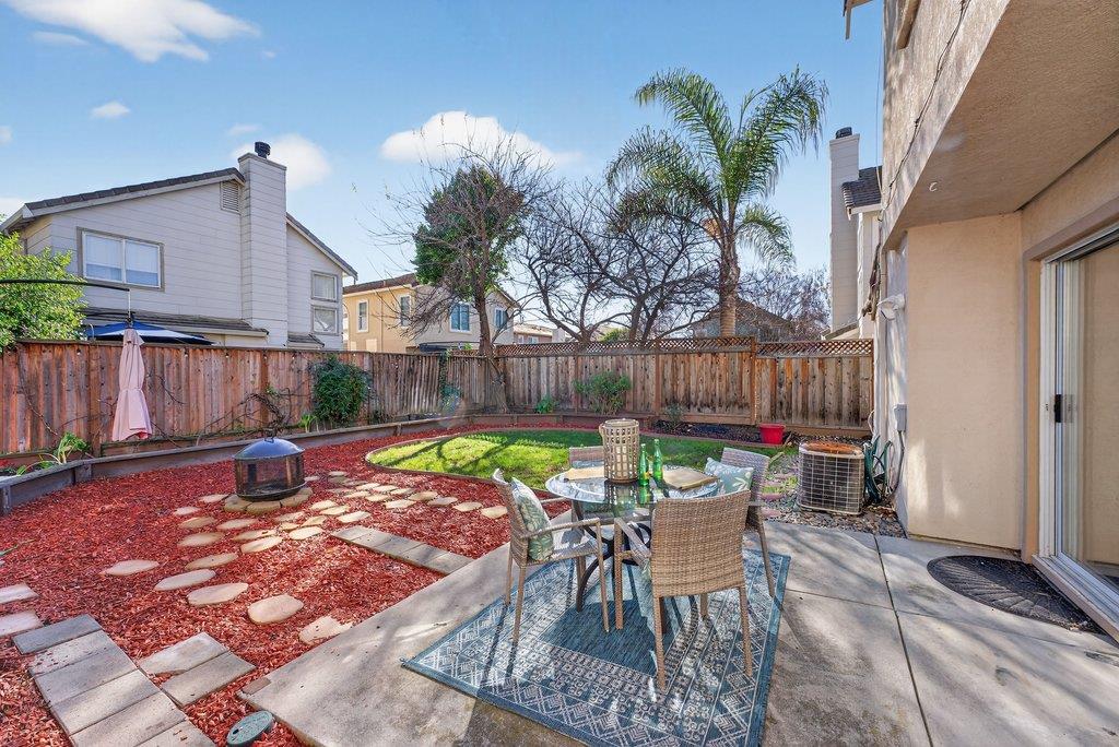 9336 Lariat Drive Gilroy, CA 95020 - Photo 26 of 41 a view of a backyard with a patio and outdoor seating