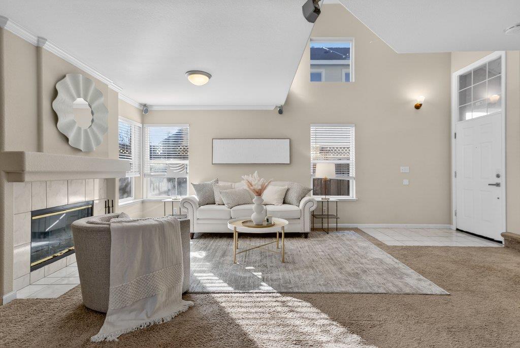 9336 Lariat Drive Gilroy, CA 95020 - Photo 3 of 41 a living room with fireplace furniture and a rug