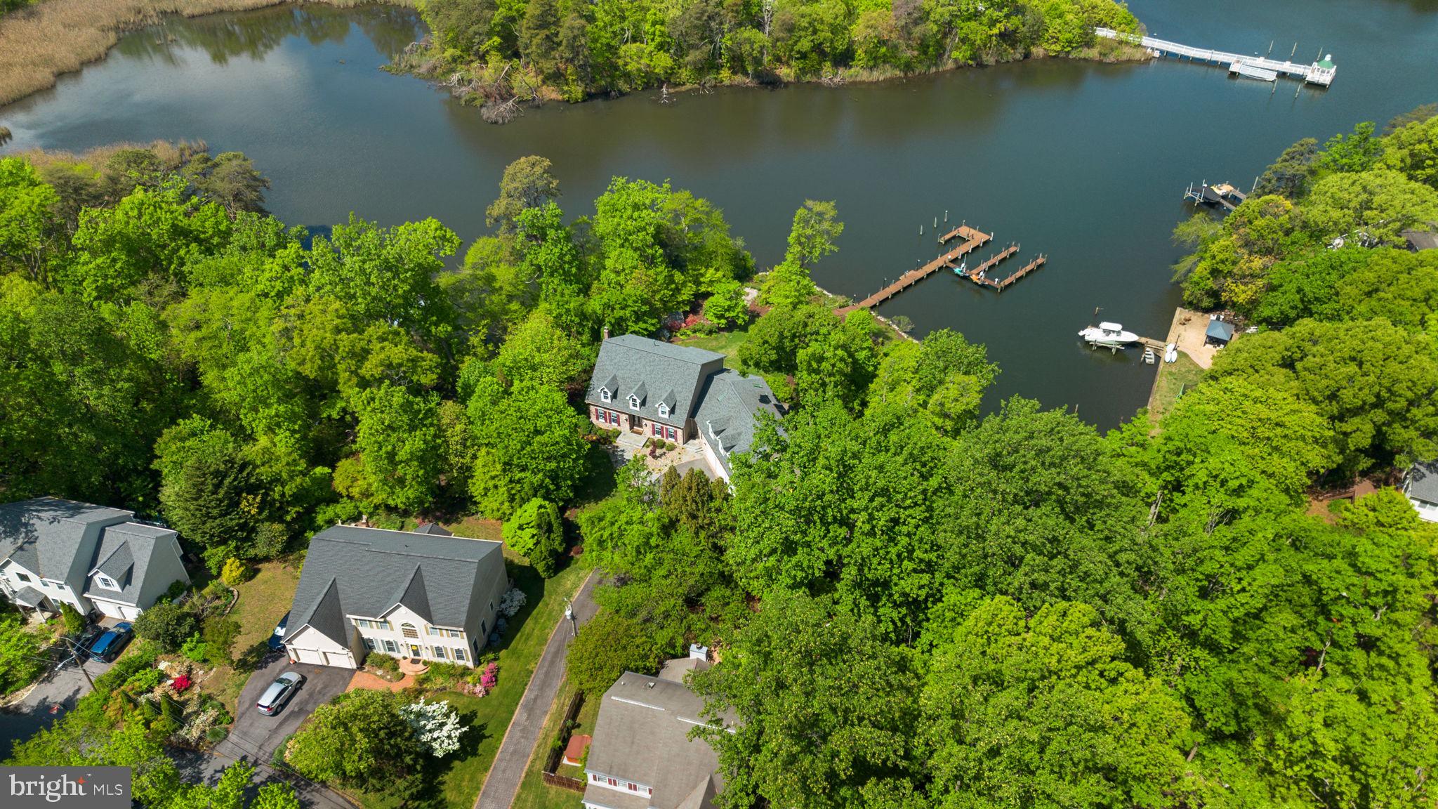798 Creek View Road Severna Park, MD 21146 - Photo 1 of 72 an aerial view of a house with a yard and lake view