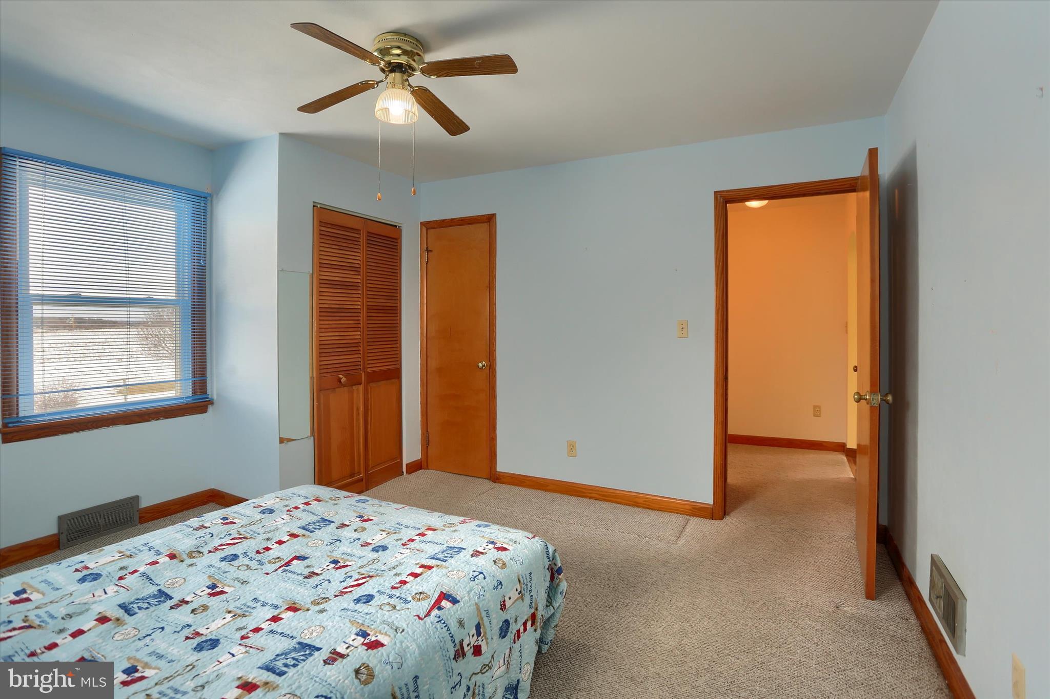 678 Littlestown Road Littlestown, PA 17340 - Photo 11 of 53 a bedroom with a bed and a window