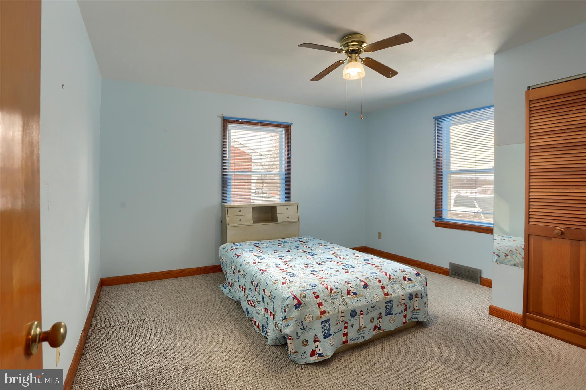 678 Littlestown Road Littlestown, PA 17340 - Photo 12 of 55 a bedroom with a bed and a chandelier