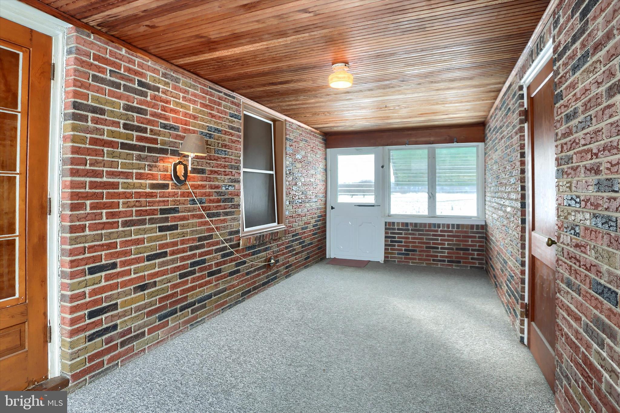 678 Littlestown Road Littlestown, PA 17340 - Photo 16 of 55 a view of wooden floor and brick walls
