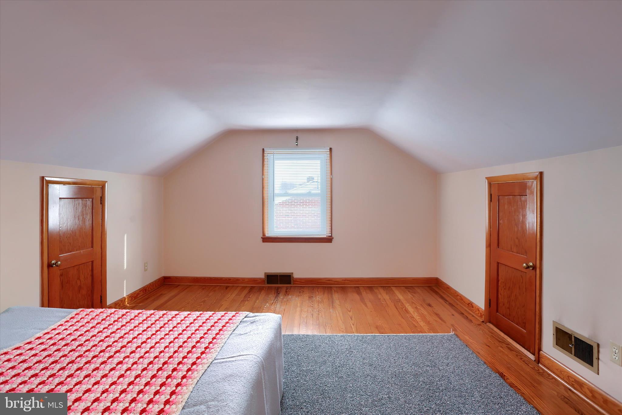 678 Littlestown Road Littlestown, PA 17340 - Photo 18 of 55 a room with wooden floor and window