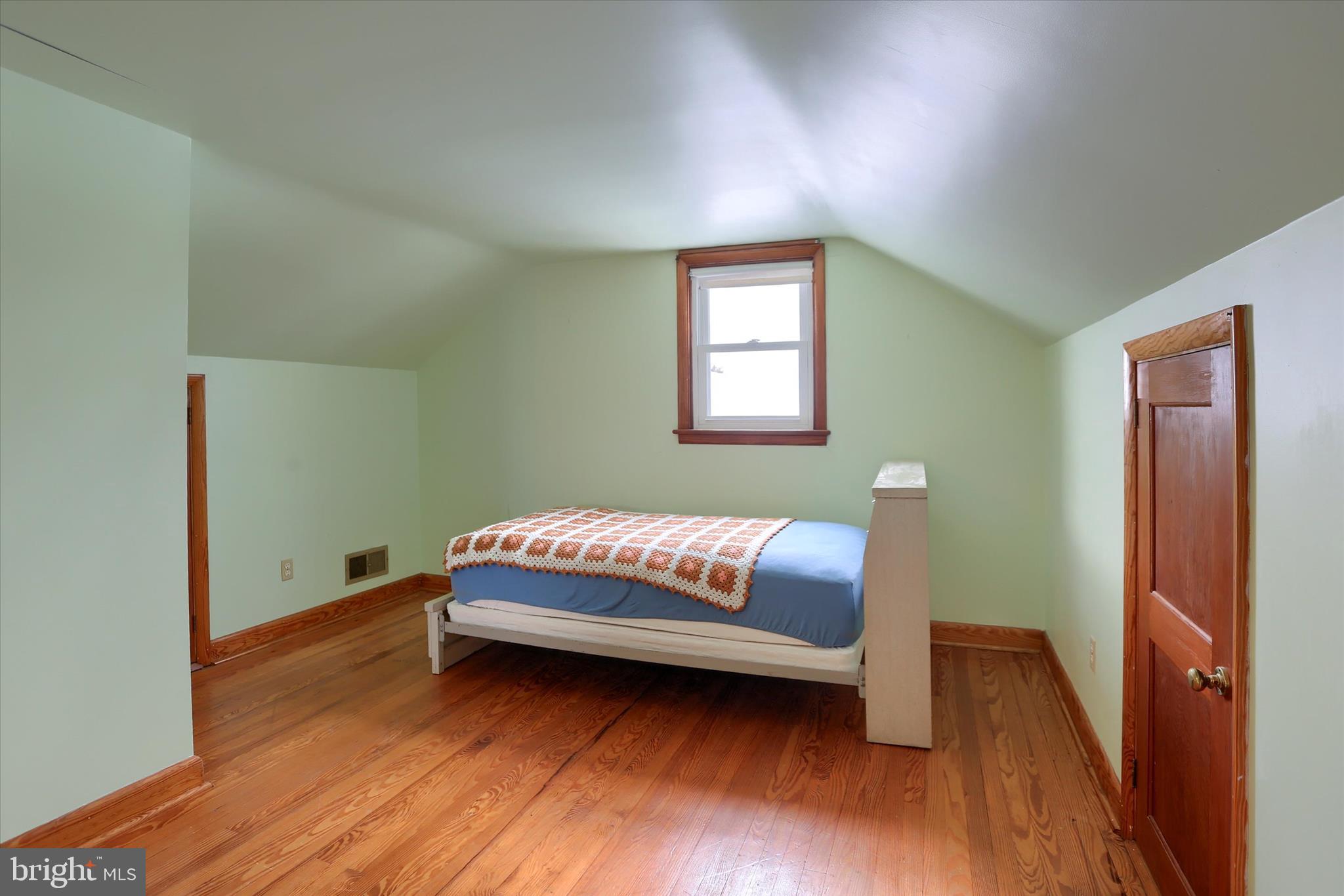 678 Littlestown Road Littlestown, PA 17340 - Photo 21 of 55 a room with a bed and a window