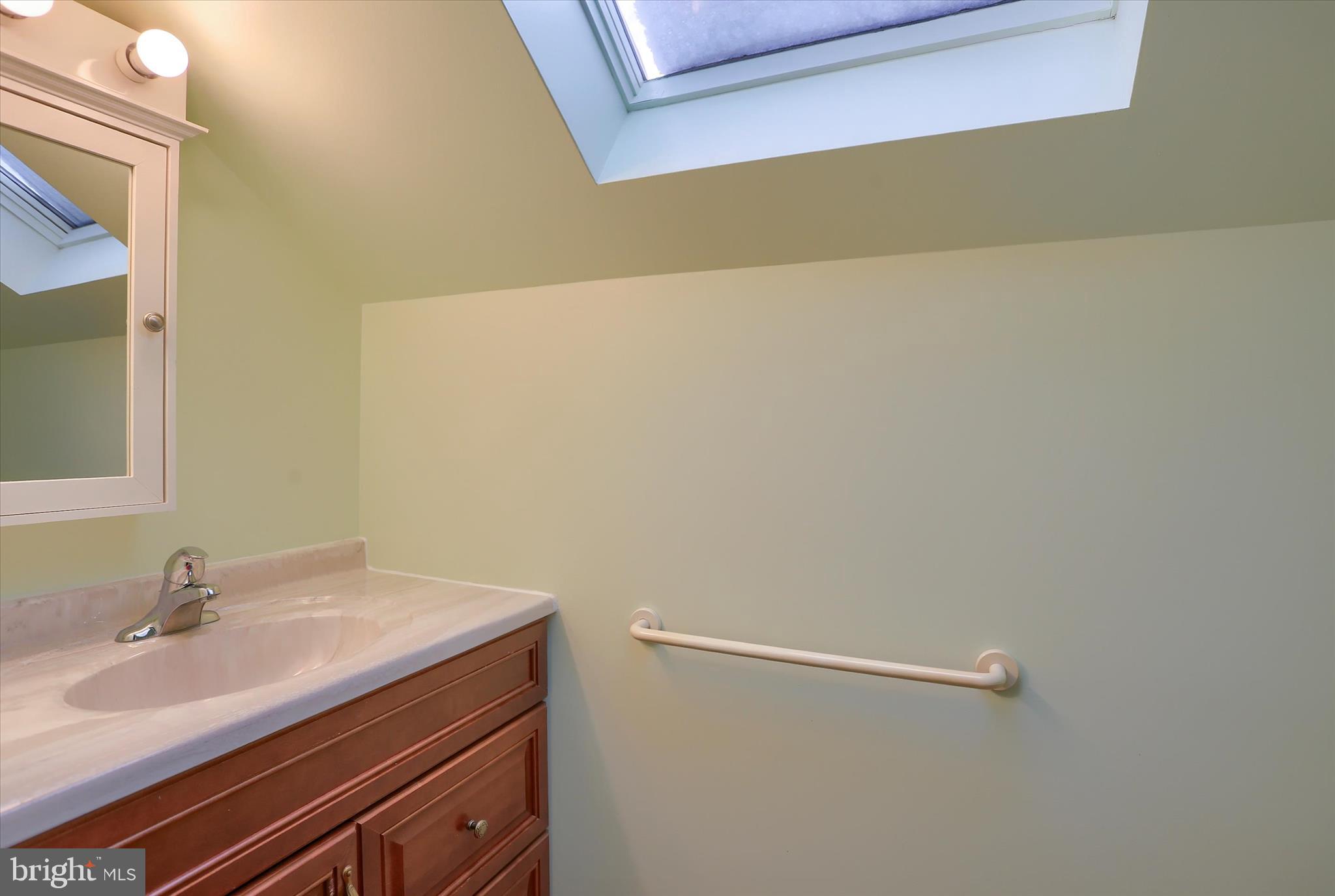 678 Littlestown Road Littlestown, PA 17340 - Photo 25 of 55 a bathroom with a sink and a mirror