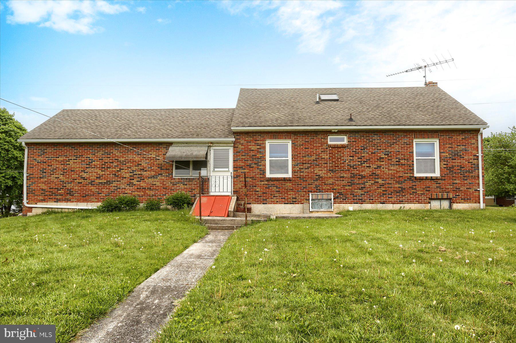 678 Littlestown Road Littlestown, PA 17340 - Photo 39 of 53 a front view of a house with a yard