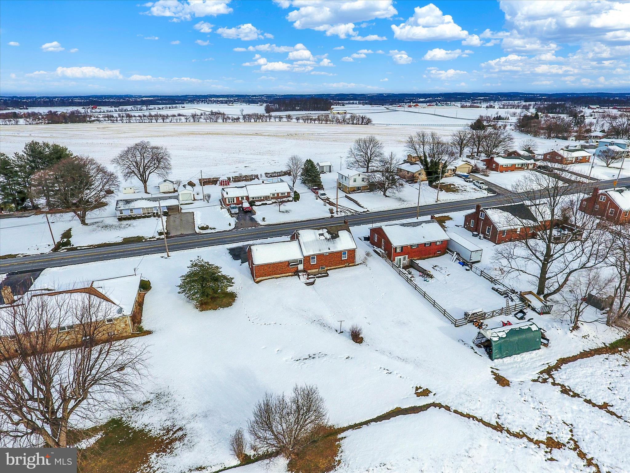 678 Littlestown Road Littlestown, PA 17340 - Photo 42 of 55 a view of a swimming pool and lounge chair