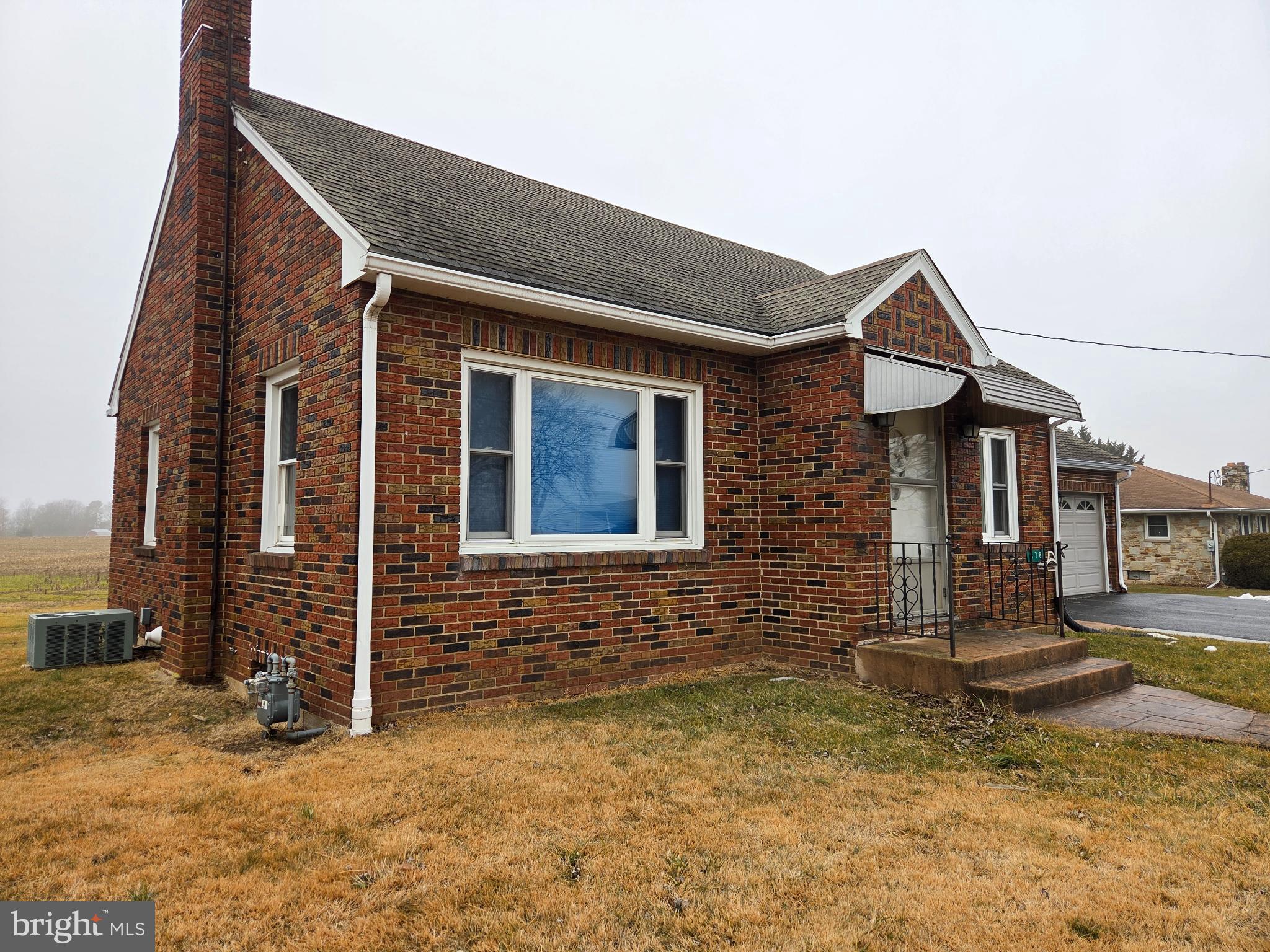 678 Littlestown Road Littlestown, PA 17340 - Photo 47 of 55 a front view of a house with a yard