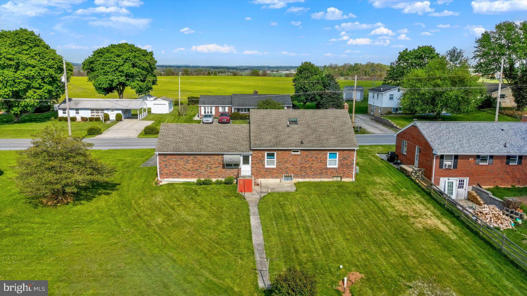 678 Littlestown Road Littlestown, PA 17340 - Photo 50 of 53 an aerial view of a house with a garden