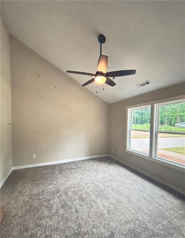 816 Forrest Avenue Rockmart, GA 30153 - Photo 11 of 18 a view of an empty room with window and chandelier fan