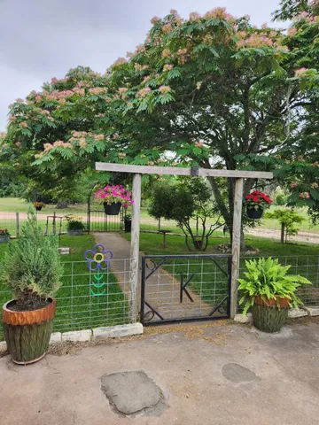 a childrens park with lots of swings and slides