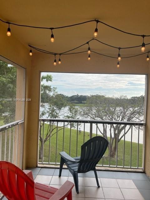 15330 Southwest 106th Terrace, Unit 918 Miami, FL 33196 - Photo 11 of 11 a view of a chair in the balcony