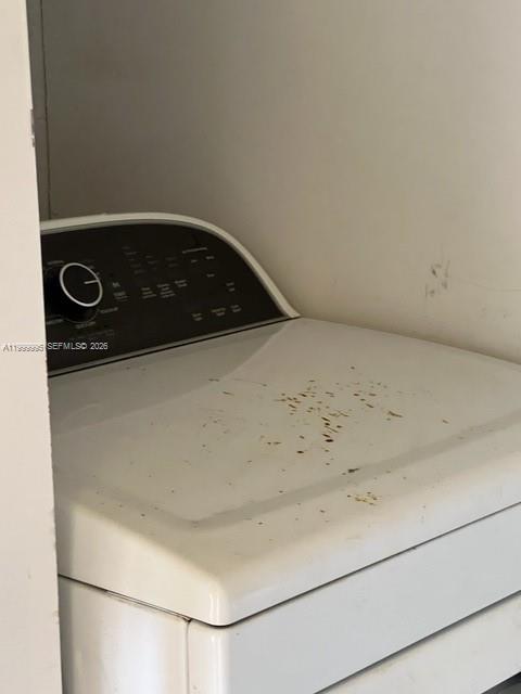15330 Southwest 106th Terrace, Unit 918 Miami, FL 33196 - Photo 4 of 11 a close up view of washer and dryer