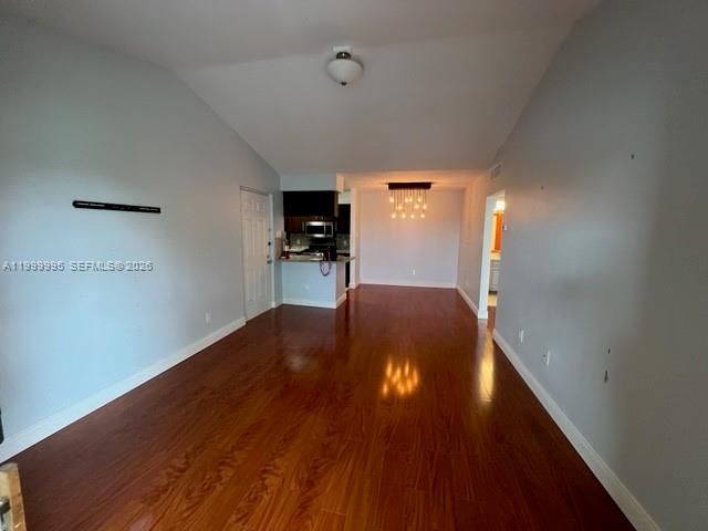 15330 Southwest 106th Terrace, Unit 918 Miami, FL 33196 - Photo 7 of 11 a very nice looking room with wooden floor