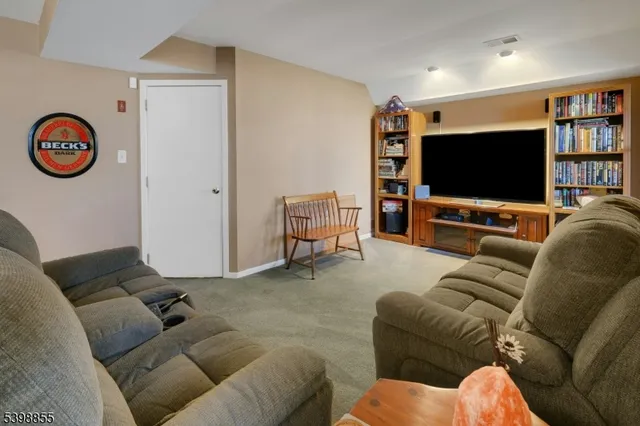 a bedroom with furniture and windows