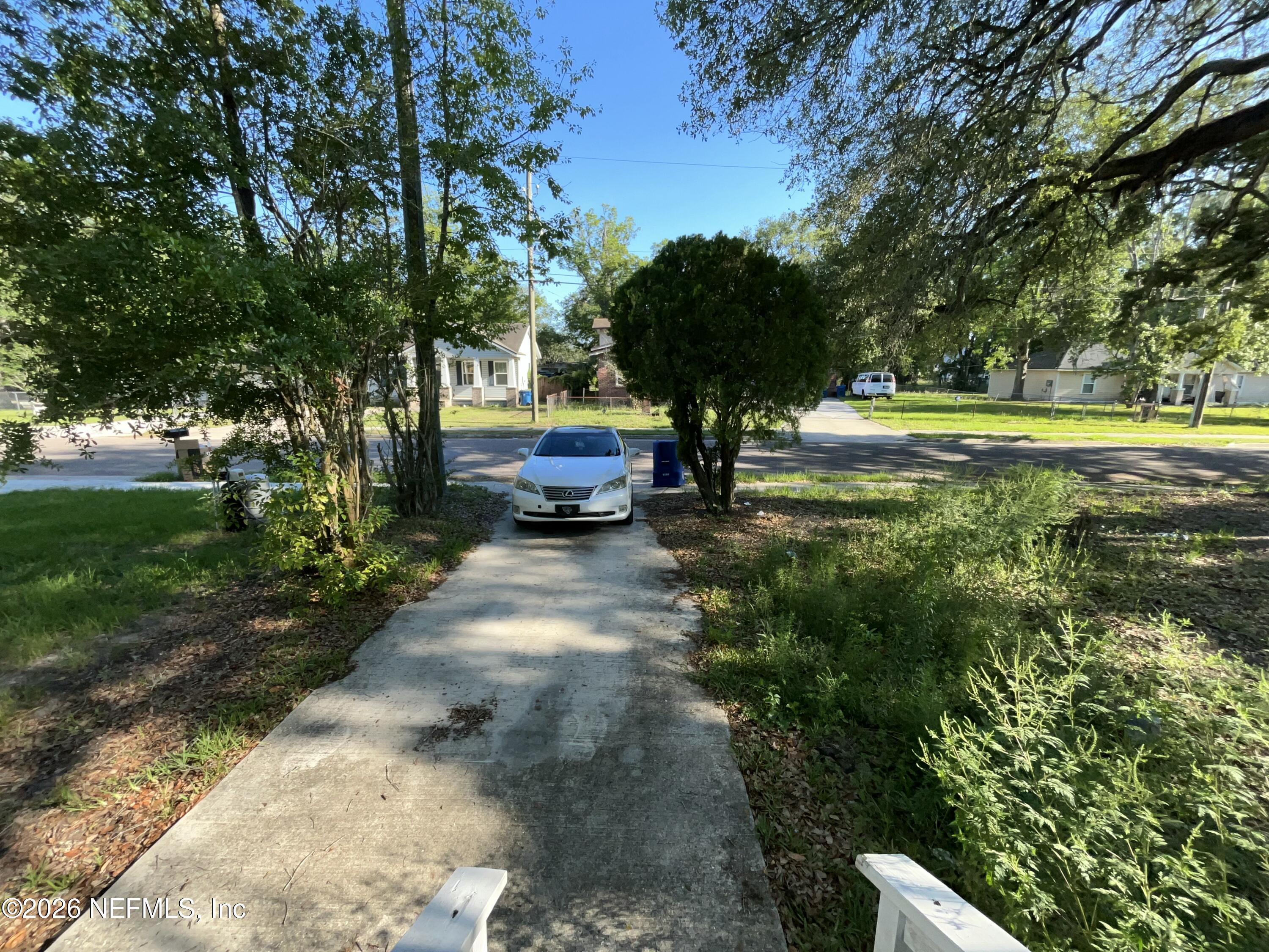 2017 Talladega Road Jacksonville, FL 32209 - Photo 10 of 34 a view of a swimming pool with a yard