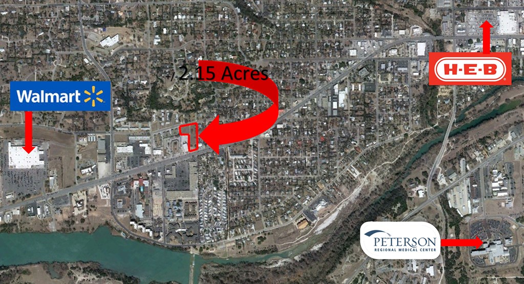 800 Junction Highway Kerrville, TX 78028 - Photo 3 of 4 a street sign that is on a tree