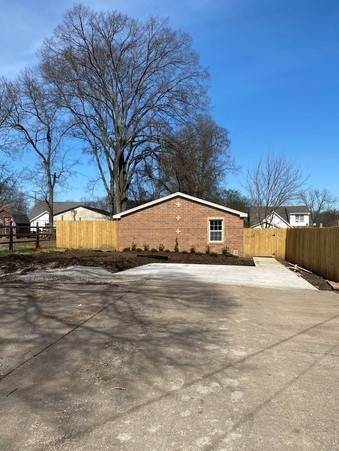 209 Neelys Bend Road, Unit B Madison, TN 37115 - Photo 2 of 11 a house with a yard