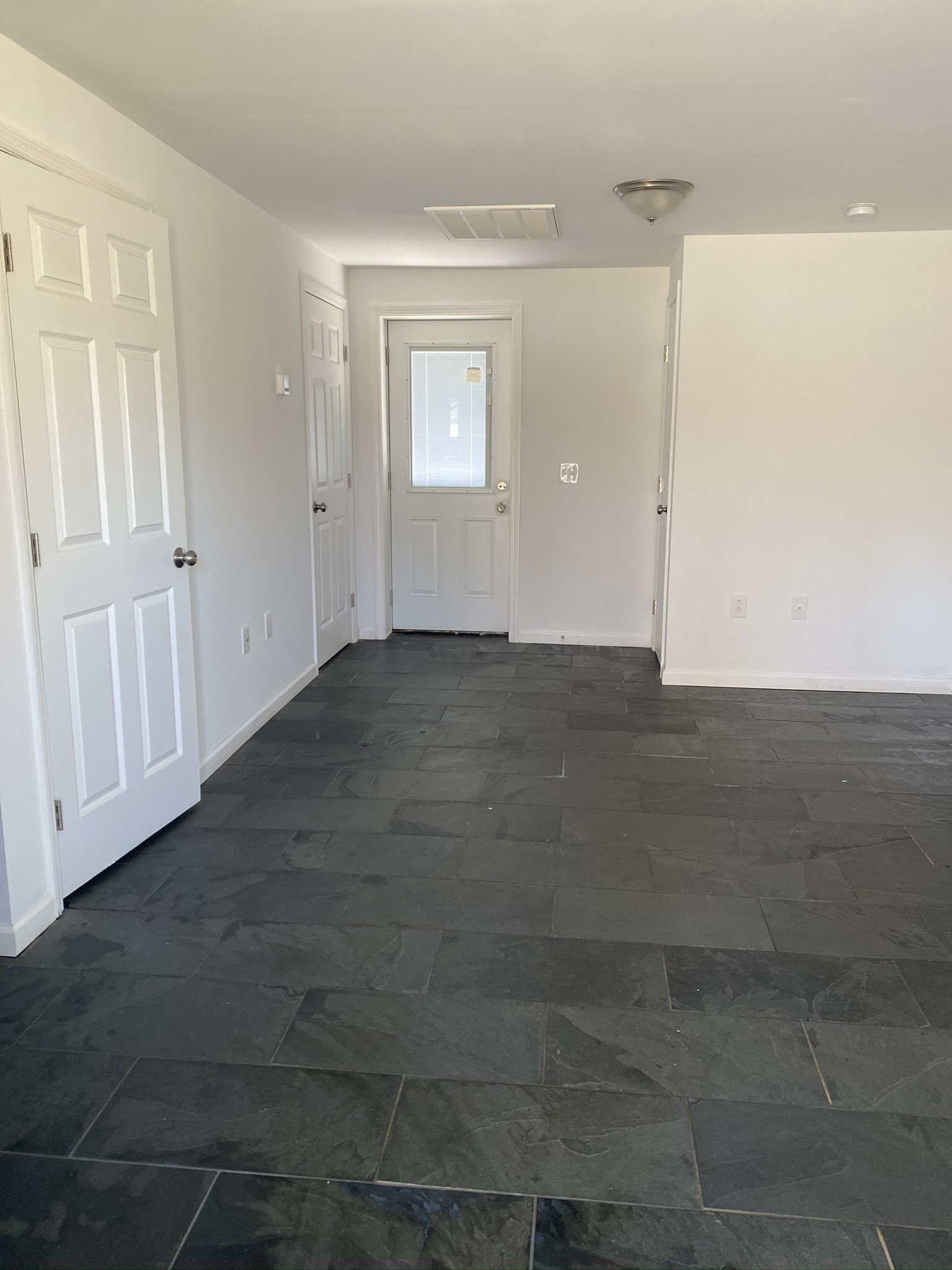 209 Neelys Bend Road, Unit B Madison, TN 37115 - Photo 9 of 11 an empty room with windows