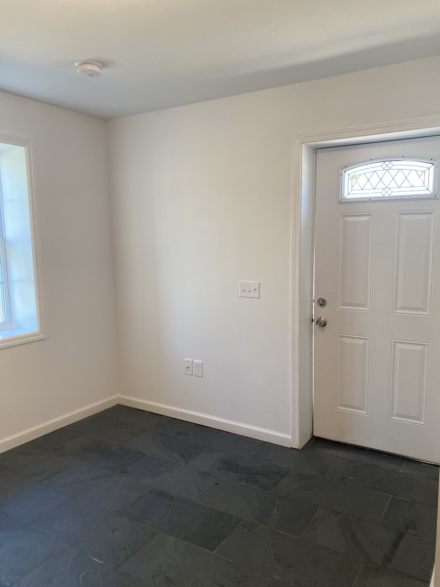 209 Neelys Bend Road, Unit B Madison, TN 37115 - Photo 10 of 11 an empty room with windows