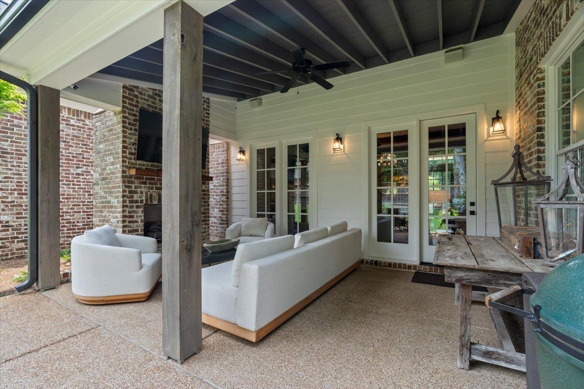 240 Burrows Road Collierville, TN 38017 - Photo 31 of 37 Covered outdoor patio featuring a textured aggregate surface