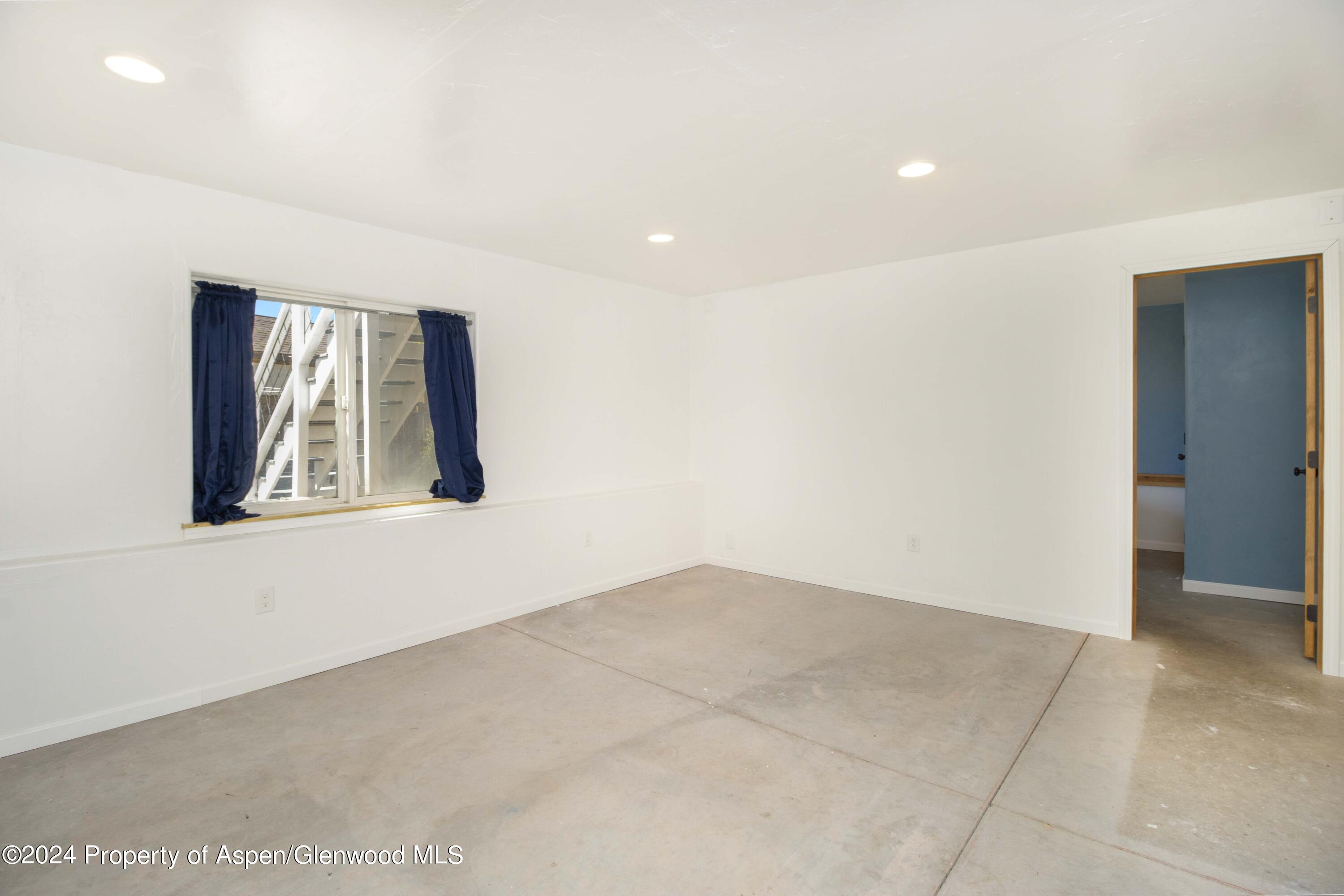 783 East 19th Street Rifle, CO 81650 - Photo 20 of 21 an empty room with windows