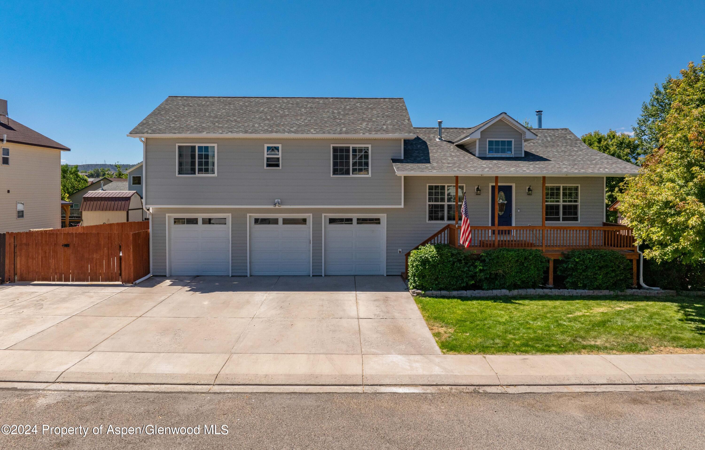 783 East 19th Street Rifle, CO 81650 - Photo 2 of 21 a front view of house with yard and green space