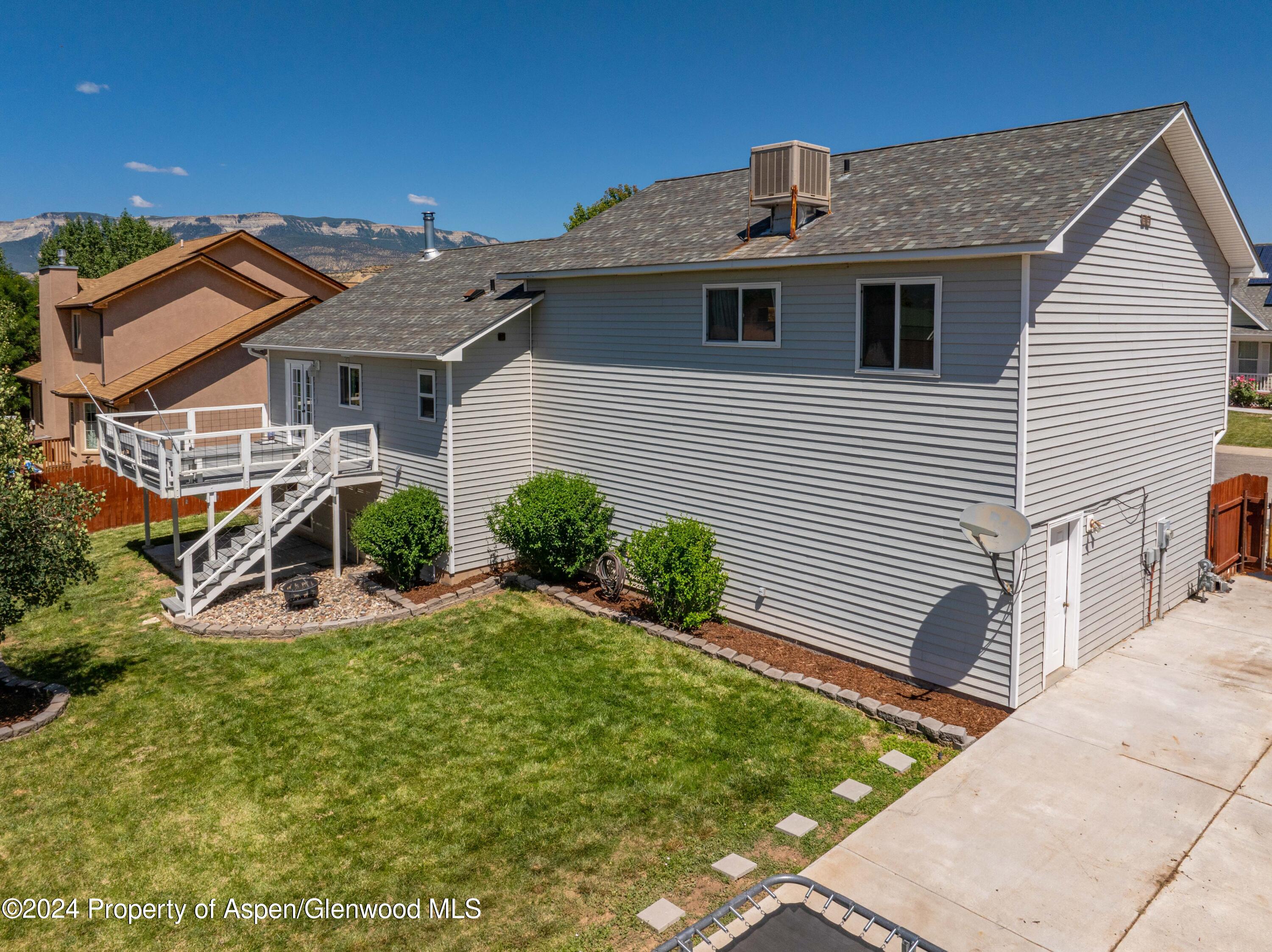 783 East 19th Street Rifle, CO 81650 - Photo 3 of 21 a view of a house with backyard and sitting area