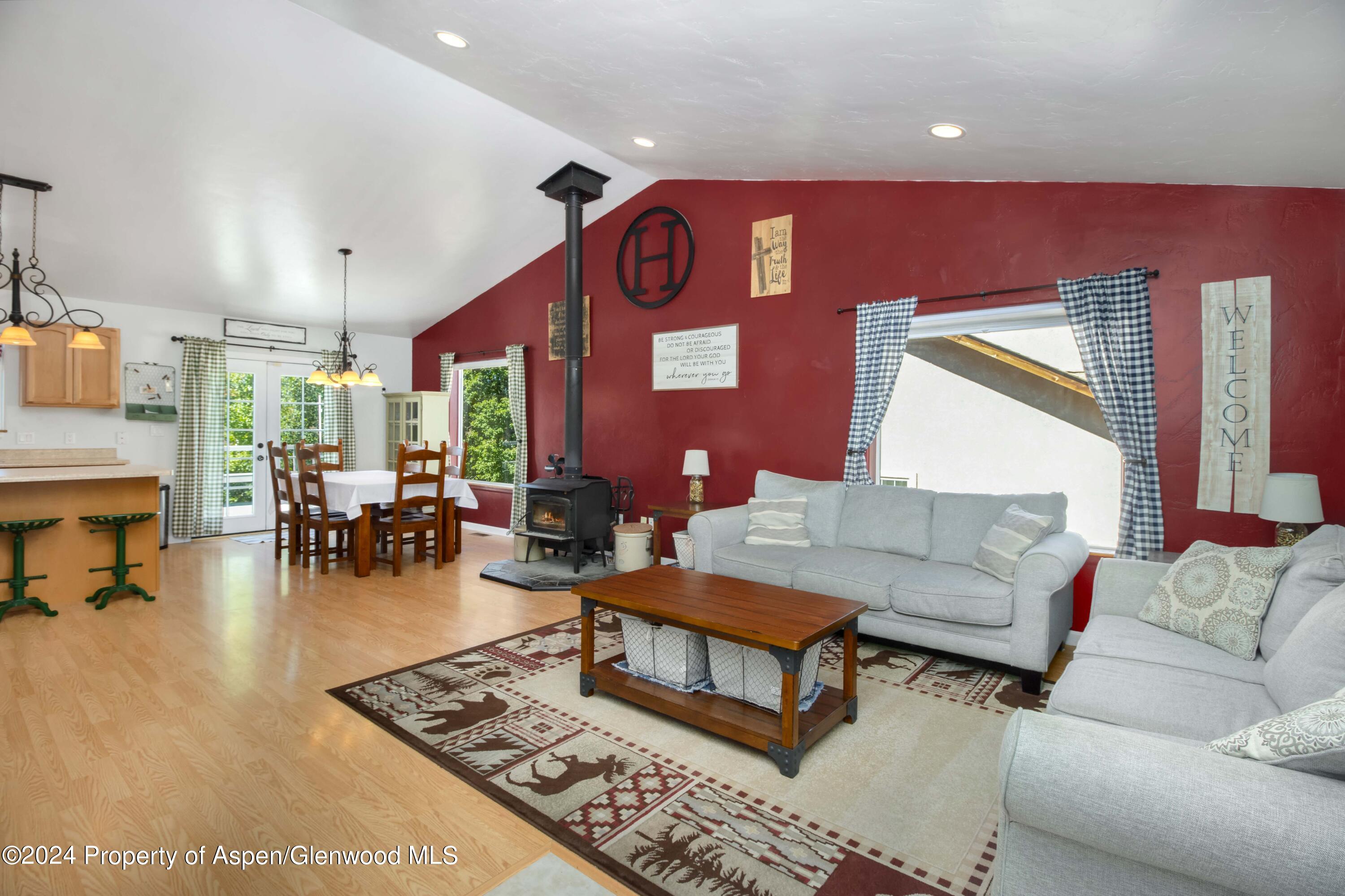 783 East 19th Street Rifle, CO 81650 - Photo 7 of 21 a living room with furniture and a large window