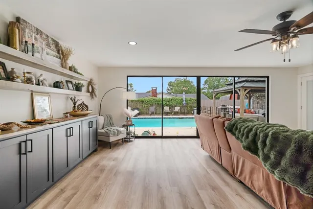 a kitchen with stainless steel appliances granite countertop a stove and a refrigerator