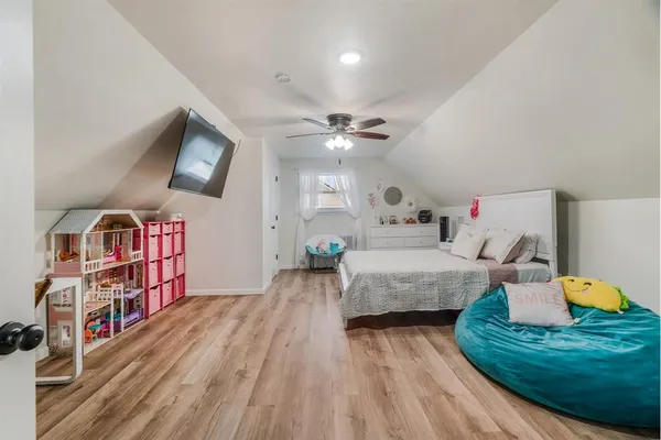 a kitchen with stainless steel appliances granite countertop a stove a sink a refrigerator a microwave and cabinets