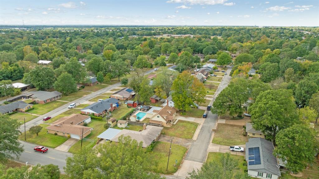 3276 Cleveland Street Paris, TX 75460 - Photo 3 of 31 an aerial view of residential houses with outdoor space