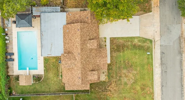 aerial view of a house with swimming pool