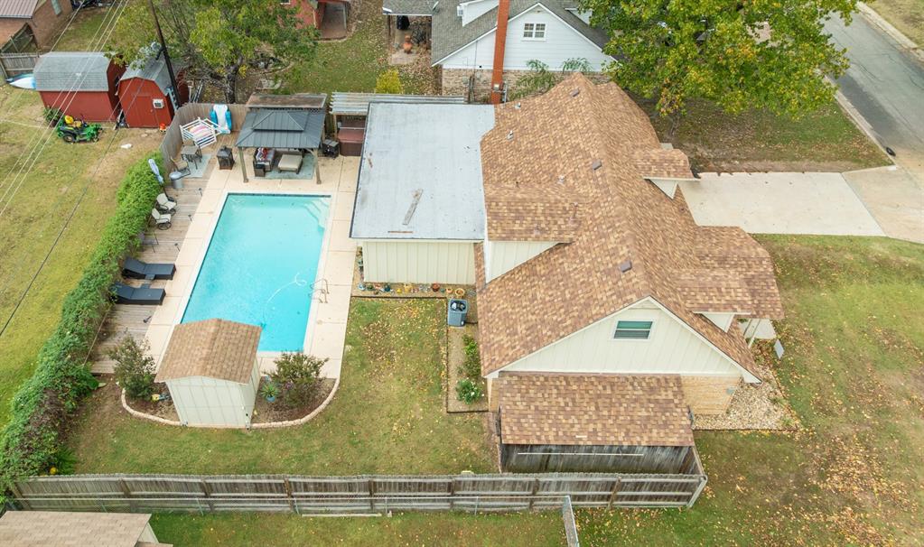 3276 Cleveland Street Paris, TX 75460 - Photo 8 of 31 aerial view of a house with swimming pool
