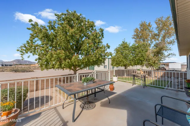 a living room with furniture or couch and a flat screen tv