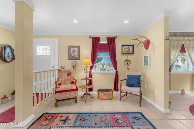 a living room with furniture and a couch