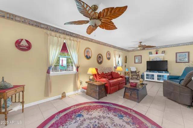 a kitchen with a sink a stove and cabinets