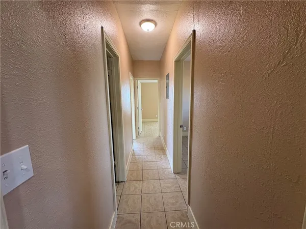 a bathroom with a sink a toilet and bathtub