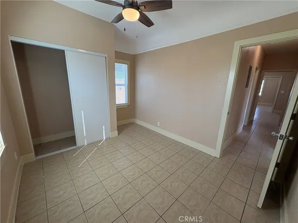 a view of a hallway with a door