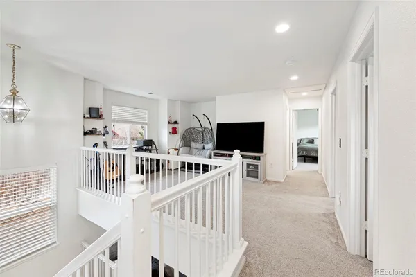 a view of a living room and a flat screen tv