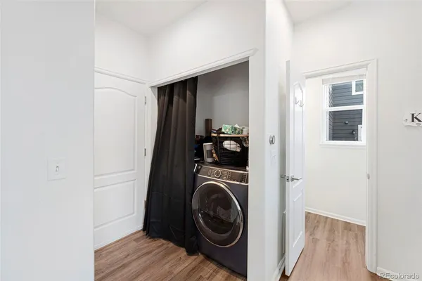 a view of storage and utility room with washer and dryer