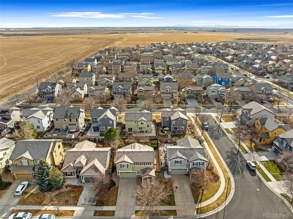 an aerial view of residential building with ocean view