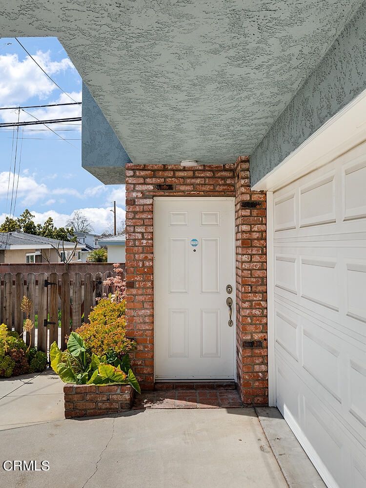 159-161 May Avenue Monrovia, CA 91016 - Photo 17 of 33 a view of a pathway along a building
