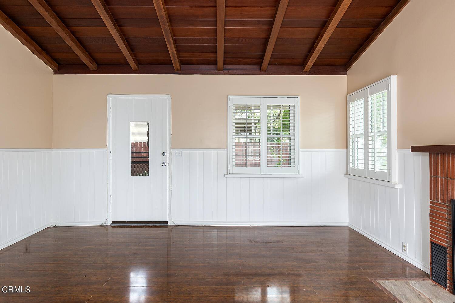 159-161 May Avenue Monrovia, CA 91016 - Photo 5 of 33 a view of an empty room with wooden floor and windows