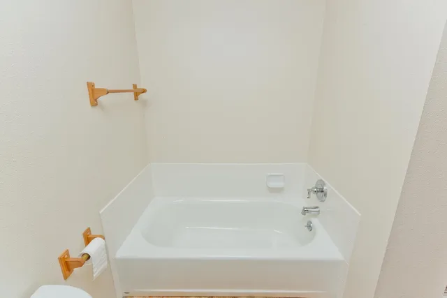a bathroom with a bathtub