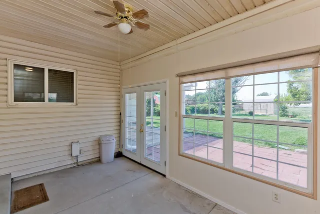 a view of a livingroom with an outdoor space and deck