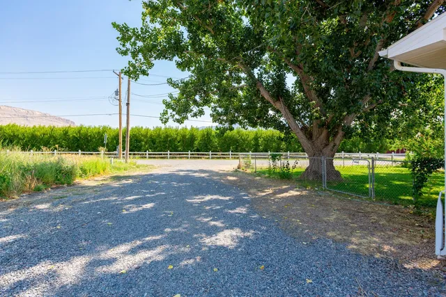a house with river in front of it