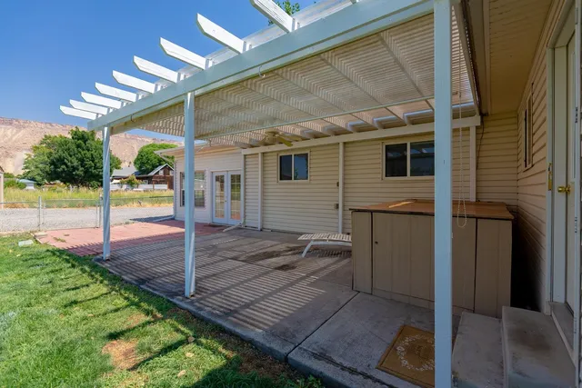 a front view of a house with a large window