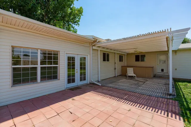 a view of a golf course with a tree